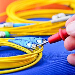 Technian testing a fibre optic cable